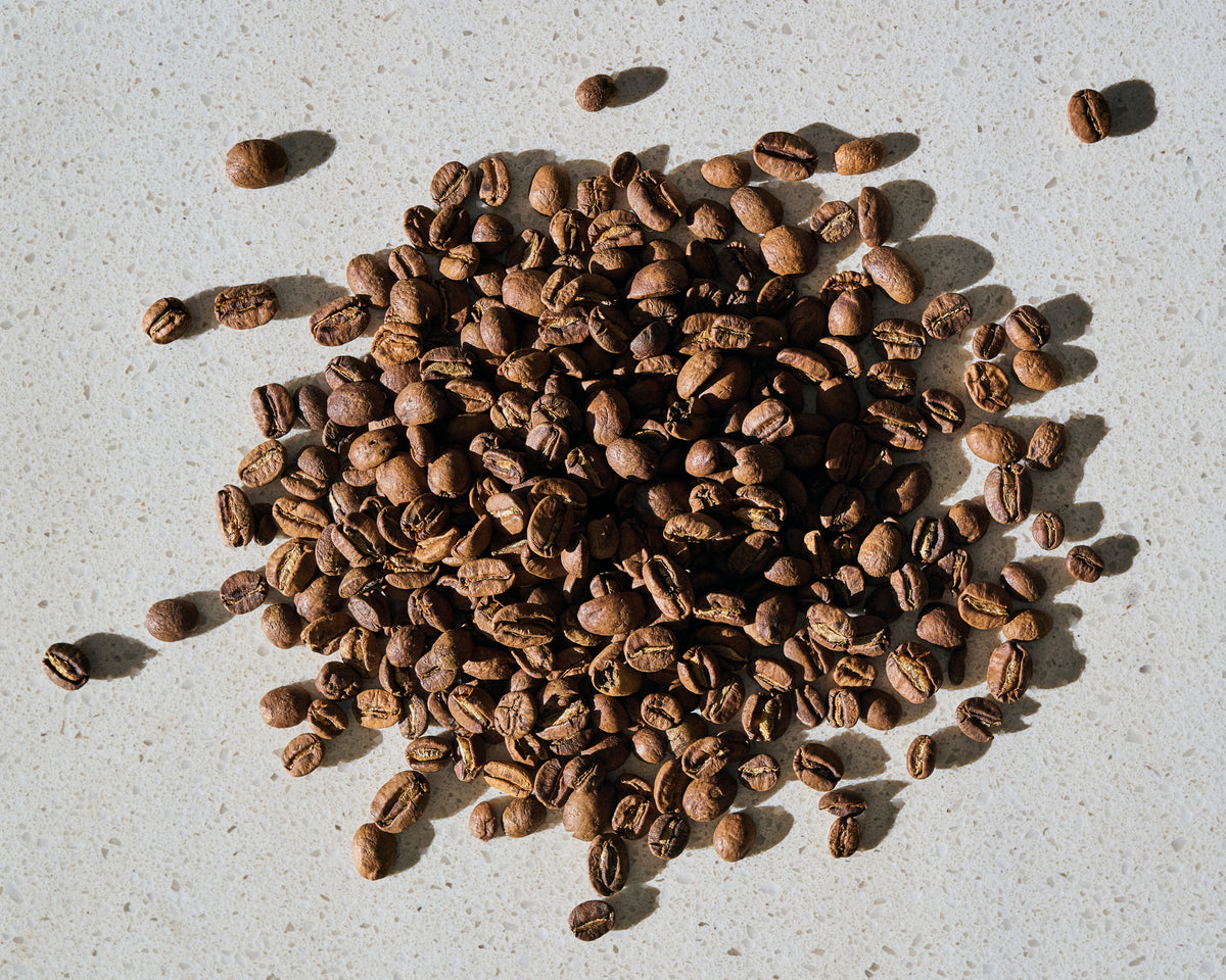 Light-roasted Ainanani Kona Geisha whole coffee beans